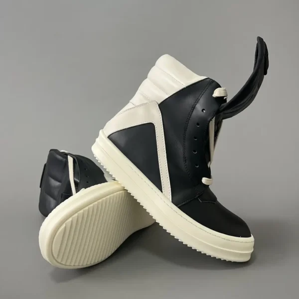 Rick Owens has a black and white inverted triangle.
     
market - Image 7