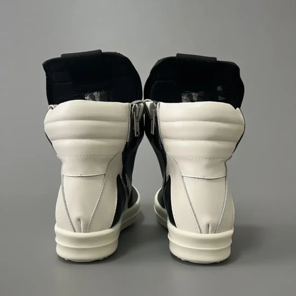 Rick Owens has a black and white inverted triangle.
     
market - Image 5