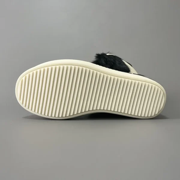 Rick Owens' horsehair has a black and white inverted triangle.
  7 - Image 6