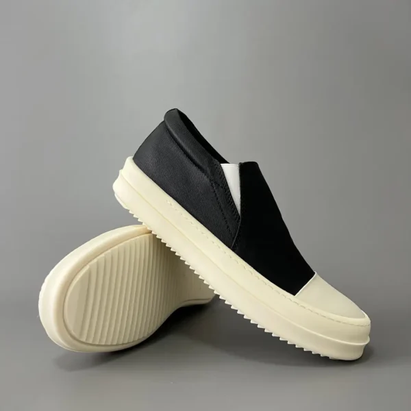 Rick Owens DRKSHDW old wax cloth kicks and covers his feet. - Image 7