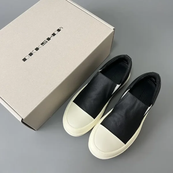 Rick Owens DRKSHDW old wax cloth kicks and covers his feet. - Image 9