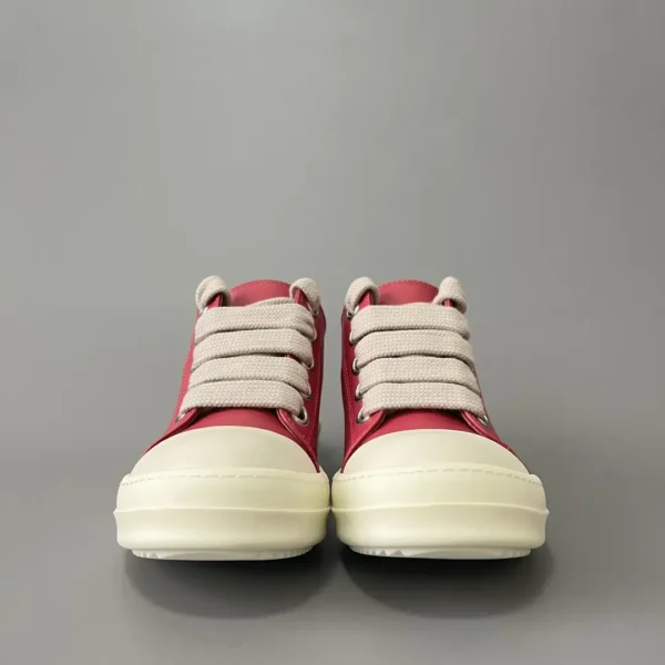 Rick Owens has a Low cut lace up with a thick pink hole. - Image 2