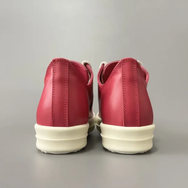 Rick Owens has a Low cut lace up with a thick pink hole. - Image 5