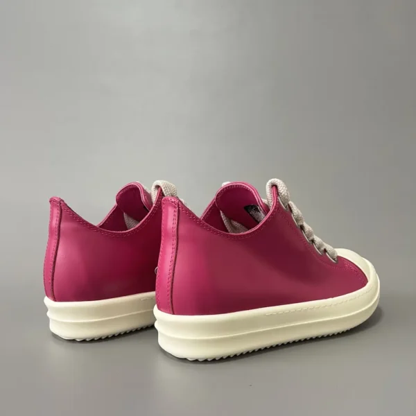 Rick Owens has a Low cut lace up with a thick pink hole. - Image 4