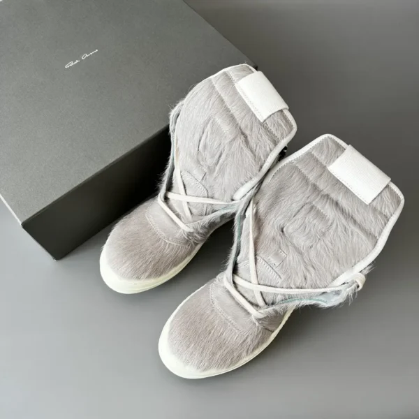 Rick Owens' horsehair is gray white inverted triangle.
  7 - Image 9