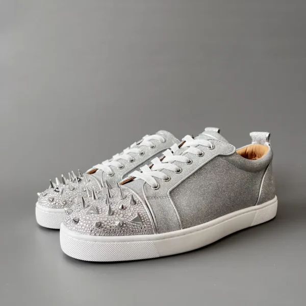 Christian Louboutin Low cut board shoes with silver drill rivets