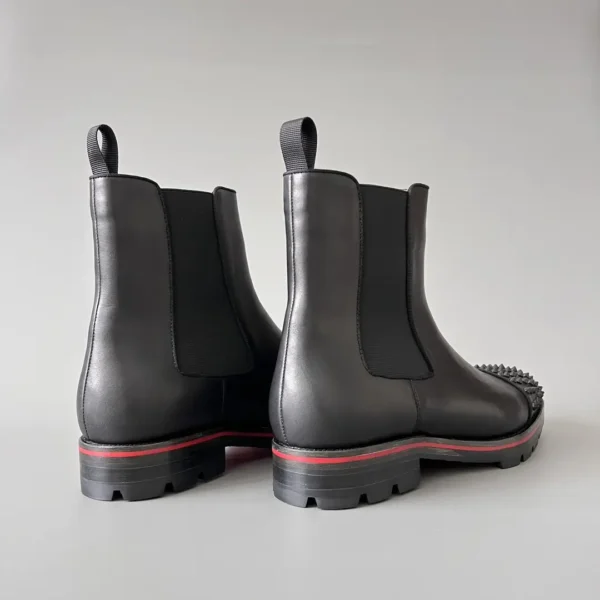 Christian Louboutin Chelsea boots with black cowhide studs. - Image 4