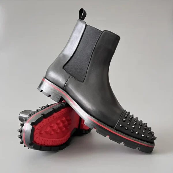 Christian Louboutin Chelsea boots with black cowhide studs. - Image 7