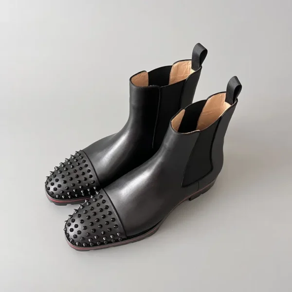 Christian Louboutin Chelsea boots with black cowhide studs. - Image 8