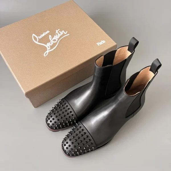 Christian Louboutin Chelsea boots with black cowhide studs. - Image 9
