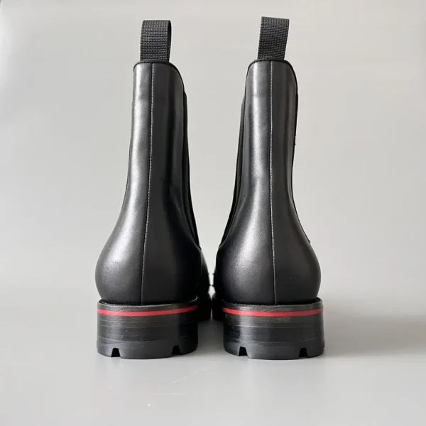 Christian Louboutin Chelsea boots with black cowhide studs. - Image 5